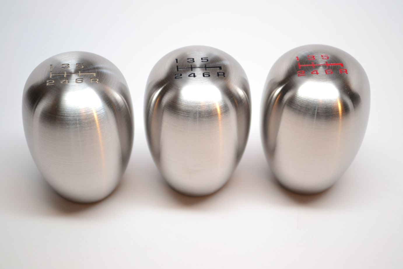 Moddiction Stainless steel and Titanium countersunk shift knobs. Many